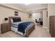 Bedroom including a bed, desk, and a window that lets in light at 2705 Fox View Trl, Franktown, CO 80116