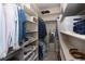 Walk-in closet with built-in shelving and ample storage space for clothing and accessories at 2705 Fox View Trl, Franktown, CO 80116