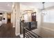 Beautiful view of the entryway, stairs, and dining room, showcasing a chandelier and open layout at 2705 Fox View Trl, Franktown, CO 80116