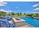 Relax in the sunshine next to this gorgeous pool with a firepit and great views of the green space at 2705 Fox View Trl, Franktown, CO 80116