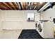 Spacious unfinished basement area with washer and dryer hookups at 4604 Routt St, Wheat Ridge, CO 80033