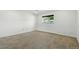 Bedroom with neutral walls, a window and carpet floors at 4604 Routt St, Wheat Ridge, CO 80033