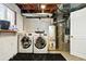 Functional laundry room with washer, dryer, and utility connections at 4604 Routt St, Wheat Ridge, CO 80033