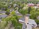 Aerial view of the property showcasing its location in a quiet, tree-lined neighborhood with convenient street access at 3218 S Lafayette St, Englewood, CO 80113