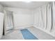 Bright bedroom featuring a large mirror and minimalist decor, creating a peaceful and serene atmosphere at 3218 S Lafayette St, Englewood, CO 80113