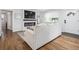 Comfortable living room with a modern fireplace, a flat-screen TV, and hardwood floors at 3218 S Lafayette St, Englewood, CO 80113