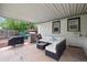 Inviting outdoor patio with comfortable seating and grill, ideal for relaxing and entertaining guests at 3218 S Lafayette St, Englewood, CO 80113