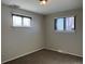 Spacious bedroom with neutral walls and carpet at 3236 Carson St, Aurora, CO 80011