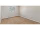 Bedroom featuring carpet and a window at 7318 W Cedar Cir, Lakewood, CO 80226