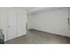 Spacious basement with neutral carpet and door leading to additional storage space at 10886 Bayfield Way, Parker, CO 80138
