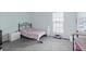 Bright bedroom with carpet, a large window, and furnishings at 10886 Bayfield Way, Parker, CO 80138