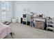 Bright bedroom with carpet, large window, and decorative touches at 10886 Bayfield Way, Parker, CO 80138