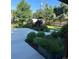 Landscaped backyard featuring manicured garden beds and trimmed lawns at 290 Pierce St, Lakewood, CO 80226
