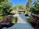 Spacious home backyard featuring a stone pathway leading up to the home at 290 Pierce St, Lakewood, CO 80226
