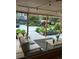 Outdoor patio featuring a seating area with a beautifully landscaped backyard at 290 Pierce St, Lakewood, CO 80226