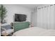 Serene bedroom with a comfortable sitting area and plenty of closet space at 290 Pierce St, Lakewood, CO 80226