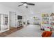 Spacious playroom with built-in shelving, a play area, and plenty of natural light at 290 Pierce St, Lakewood, CO 80226