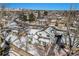 Aerial view showcasing house, yard, and surrounding neighborhood at 2527 S Coors St, Lakewood, CO 80228