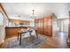 Bright dining area with wood floors and a table set for four at 2527 S Coors St, Lakewood, CO 80228