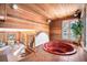 Indoor hot tub with adjacent play area at 2527 S Coors St, Lakewood, CO 80228