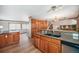 Spacious kitchen with island and double sink at 2527 S Coors St, Lakewood, CO 80228