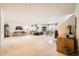 Expansive basement featuring a versatile layout, neutral carpet, and ample lighting at 4143 Da Vinci Dr, Longmont, CO 80503