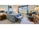 Comfortable bedroom features large window, soft carpet, and a relaxing atmosphere at 4143 Da Vinci Dr, Longmont, CO 80503