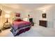 Bright bedroom featuring a well-lit interior, comfortable furnishings and soft carpeted floors at 4143 Da Vinci Dr, Longmont, CO 80503
