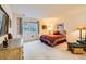 Cozy bedroom with a window view, comfortable seating and warm lighting at 4143 Da Vinci Dr, Longmont, CO 80503
