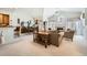 Bright living room with high ceilings, fireplace, and plush seating offers a cozy and inviting atmosphere for relaxation at 4143 Da Vinci Dr, Longmont, CO 80503