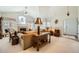 Inviting living room with fireplace, neutral tones, and comfortable seating offers a relaxing space for gatherings at 4143 Da Vinci Dr, Longmont, CO 80503