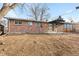 Brick rancher with covered patio and spacious backyard at 12516 E Alaska Ave, Aurora, CO 80012