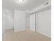 Unfinished basement area with access to additional rooms at 12516 E Alaska Ave, Aurora, CO 80012