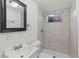 Clean basement bathroom with shower and updated fixtures at 12516 E Alaska Ave, Aurora, CO 80012