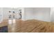 Hardwood floor dining room with French doors leading to the backyard at 12516 E Alaska Ave, Aurora, CO 80012