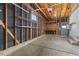Unfinished garage with ample storage options at 12516 E Alaska Ave, Aurora, CO 80012