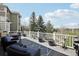 Relaxing back deck with furniture, potted plants, and open views at 423 N Snowmass Cir, Superior, CO 80027