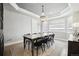 Elegant dining room with a decorative chandelier, and large windows at 423 N Snowmass Cir, Superior, CO 80027