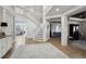 Elegant foyer with hardwood floors, a grand staircase, and views to the living and dining areas at 423 N Snowmass Cir, Superior, CO 80027