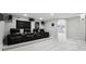 Basement home theater boasts tiered seating with plush leather recliners at 423 N Snowmass Cir, Superior, CO 80027