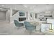 Spacious living room featuring modern furniture, a large TV, and stylish decor at 423 N Snowmass Cir, Superior, CO 80027