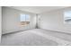 Bright bedroom with large windows and soft carpet, creating a serene and inviting atmosphere at 14441 Clover Dr, Mead, CO 80504