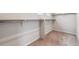 Spacious walk-in closet with ample shelving and rod space, offering plenty of storage at 14441 Clover Dr, Mead, CO 80504