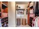 Walk-in closet with built-in shelving, drawers, and organizers offers lots of storage space at 1740 Shavano St, Longmont, CO 80504