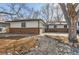 Well-maintained ranch-style home with mature landscaping at 1740 Shavano St, Longmont, CO 80504