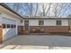 Charming ranch-style house with a front porch and views of RV parking at 1740 Shavano St, Longmont, CO 80504