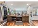 Bright and modern kitchen featuring stainless steel appliances and seamless layout at 1740 Shavano St, Longmont, CO 80504
