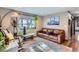 Comfortable living room area with modern furnishings, decor, and natural light at 1740 Shavano St, Longmont, CO 80504