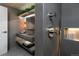 Modern bathroom featuring concrete countertop, walk in shower, and wall mounted fixtures at 2955 Inca St # 2F, Denver, CO 80202