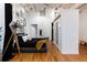 Bright bedroom with black bedding and industrial decor at 2955 Inca St # 2F, Denver, CO 80202